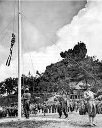 Raising the American flag 
on 22 June denoted the end of organized resistance