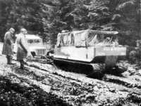 Cargo carrier M-29 (Weasel) 
pulling a jeep out of the mud near Vossenack