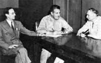 Sir James Chadwick (left) 
consulting with General Groves and Richard Tolman on Anglo-American interchange
