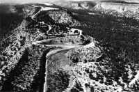 Improved Santa Fe – 
Los Alamos road, ascending to the Pajarito Plateau from the Rio Grande valley