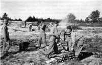 Troops of 3rd Chemical 
Mortar Battalion, firing 4