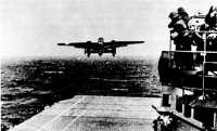 B-25 bomber loaded with 
500-pound clusters of M54 bombs leaving the flight deck of USS Hornet for the first American airstrike against the 
Japanese homeland, April 1942