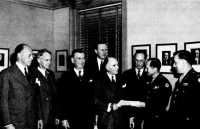 Members of the chemical 
advisory committee receiving Army Certificates of Appreciation from Brig