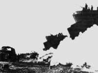 Smoke screen shields 
unloading operations during air raid alert, Salerno