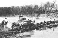 Pneumatic-float treadway 
bridge built across the Chattahoochee River, December 1941