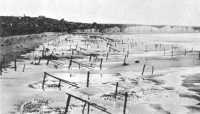 Beach and underwater 
obstacles, Normandy, France, 6 May 1944