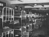 Double-decker bunks in 
permanent barracks, March Field, California