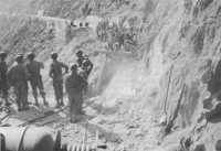 Construction begins at cape 
Calava to close gap blown by retreating Germans