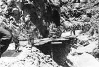General Truscott tests the 
temporary span at Cape Calava