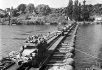 3rd Armored Division 
vehicles cross the Seine River