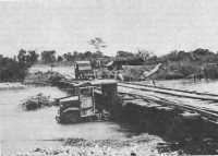 Engineers use a Japanese 
Truck to support a temporary bridge in the Cagayan valley