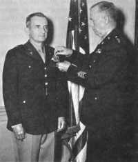 General Kenner receiving 
the DSM from General George C