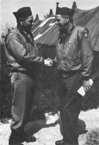 General Blesse 
congratulating Colonel Blesse on receiving the Silver Star