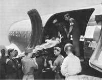 Loading an ambulance plane 
on Nettuno airstrip, June 1944