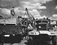 Loading equipment of the 
37th General Hospital on freight cars at Naples for shipment to Pisa