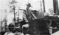 Senator Henry Cabot Lodge 
aboard medium tank M2 of the 67th Armored Regiment