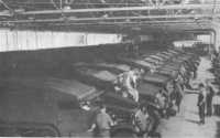 Half-track cars M2, built 
primarily to transport cargo and personnel in combat areas, nearing completion at the White Motor Company, June 1941