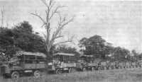 Convoy of ordnance 
maintenance trucks on maneuvers shortly after World War I