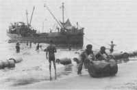 Small boats operating close 
to shore were invaluable in the shallow coastal waters surrounding New Guinea