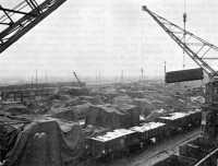 Low-priority supplies at 
Antwerp awaiting rail transportation, January 1945