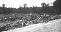 Salvage collection at dump 
in Normandy, July 1944