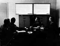 Teletype conference, as 
viewed in telecom room of the Pentagon